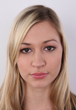 Girl shows off body covered with unnecessary outfit and spreads thighs wide