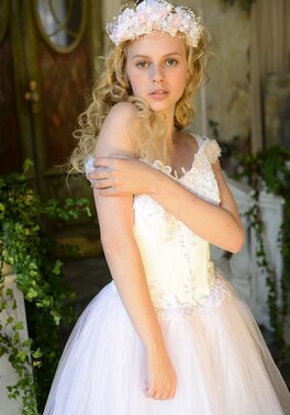 Before wedding ceremony enticing blonde performs strip show in abandoned chapel