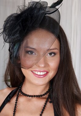 Stunning teen makes a great show of her slender body in black lingerie