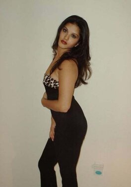 Indian girl in heels exposing her firm breasts and excellent body on the floor