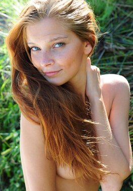Young ginger stunner needs no clothes when she sees her boyfriend's camera