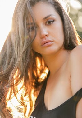 Erotic poolside session of ravishing brunette demonstrating her curves