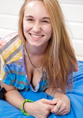 Natural boobs babe keeps her legs raised as she shows her body