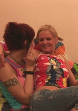 Lesbians Ksusha C and Nataly fuck on a couch with their sex toys