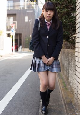 Cute Asian teen reaches her first orgasm using two vibrators