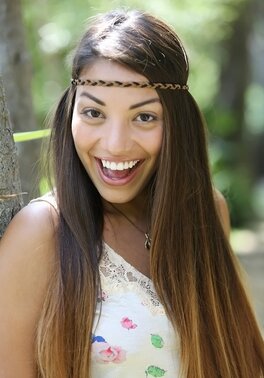 Exotic locales with verdant tropical landscapes perfect for her