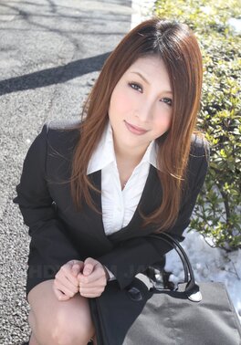 Beautiful Japanese secretary seductively poses while going at her work