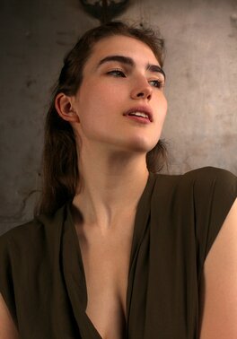 Hot girl with a pretty face and big naturals in an artsy album