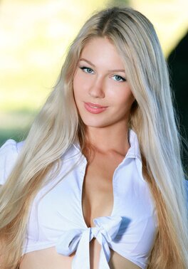 Genevieve Gandi takes a break from her badminton game to show off