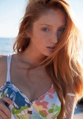 Hot redhead flaunting her big tits and her fuckable pussy