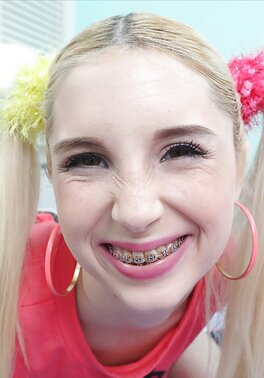Teen cutie Piper Perri enjoys a cumshot with pigtails and braces