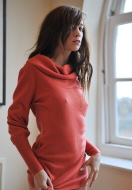 Simone takes off her blue jeans in a non-nude action