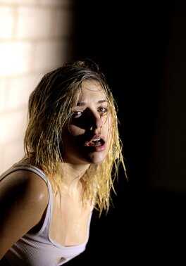 Lia Lor shows her wet small tits after training hard