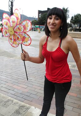 Girl with an unstylish hairdo showing her backside