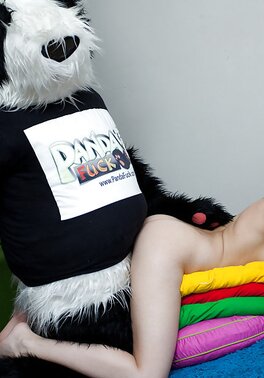 Horny teen with shaved cunt rides big panda toy wild