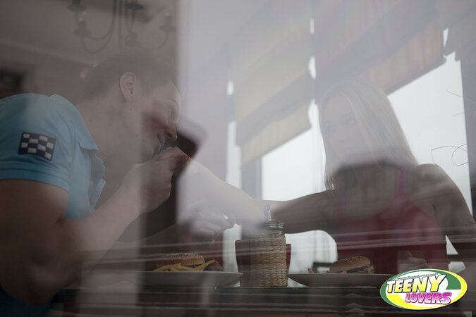 Living room is used for spicy sex with chick in pink socks being facialized