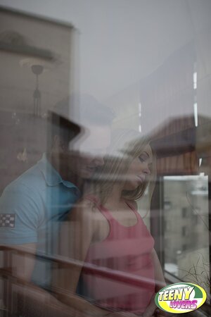 Living room is used for spicy sex with chick in pink socks being facialized