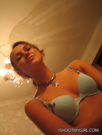 Girl in blue lingerie and high socks tries to pose quiet not to wake up caretakers