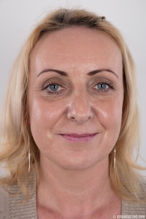 Dirty mature woman has saggy tits and belly but still poses naked in studio