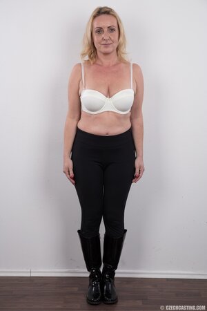 Dirty mature woman has saggy tits and belly but still poses naked in studio