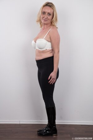 Dirty mature woman has saggy tits and belly but still poses naked in studio