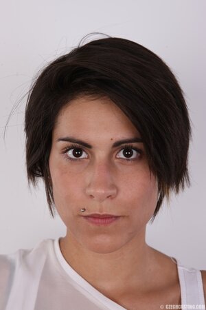 Teen with tuny tits exposes them and tries to hide vagina with hands