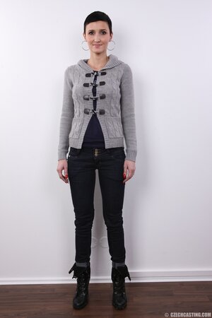 Buzzed slut with round tits exhibits pretty private parts of slender body