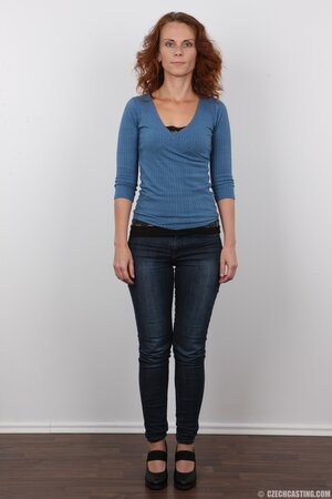 Middle-aged ginger cutie strips naked exposing her unremarkable charms