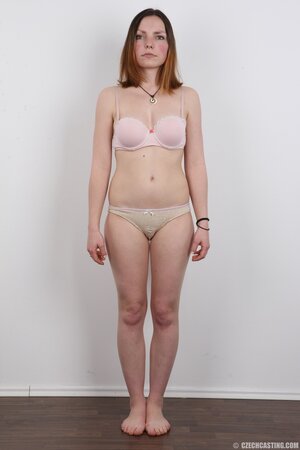 Young woman was hired as a porn model and posed naked in an empty room