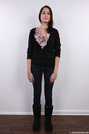 Chick with black eyes unshrouds breasts getting naked in front of the camera