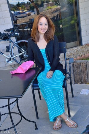 Exotic babe not shy to take off dress and pose fully naked on sidewalk