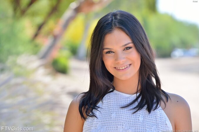 Young brunette can't suffer sexual drive anymore and goes to bed to finger vagina