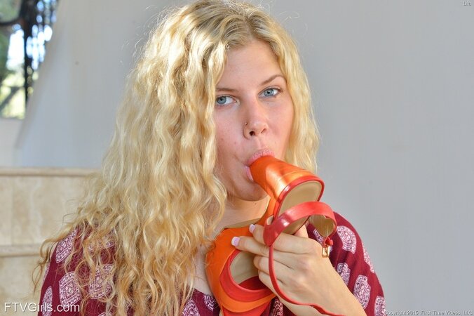 Curly girl Addison Belgium takes orange shoes off to masturbate before fitness