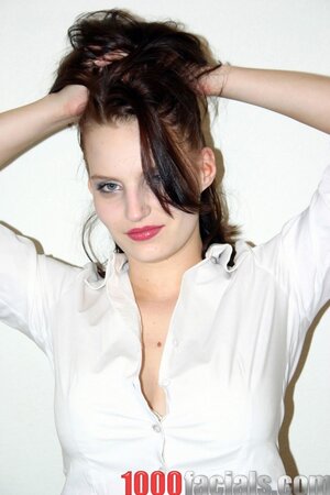 Tattooed temptress in jeans gets naked and lies down in bed to suck a cock