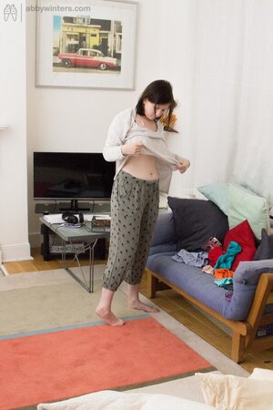 Pale slut exposes everything and even hairy pussy while wearing her outfit