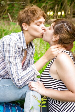 White chick with large boobs gives an outdoor penetration to short-haired friend