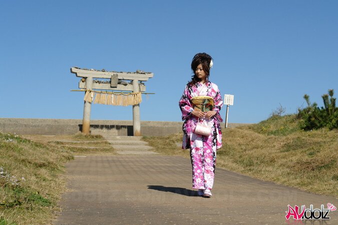 Asian slut knows her business and walks down the ocean shore attracting boys