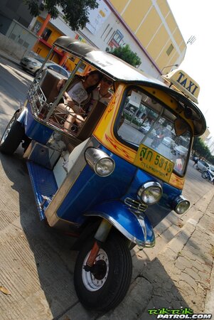 Asian slut strips in bed to get it on with another client on camera