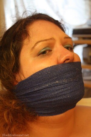 Female with huge jugs is tied up but masked man wants just to touch her hooters