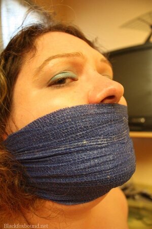 Female with huge jugs is tied up but masked man wants just to touch her hooters