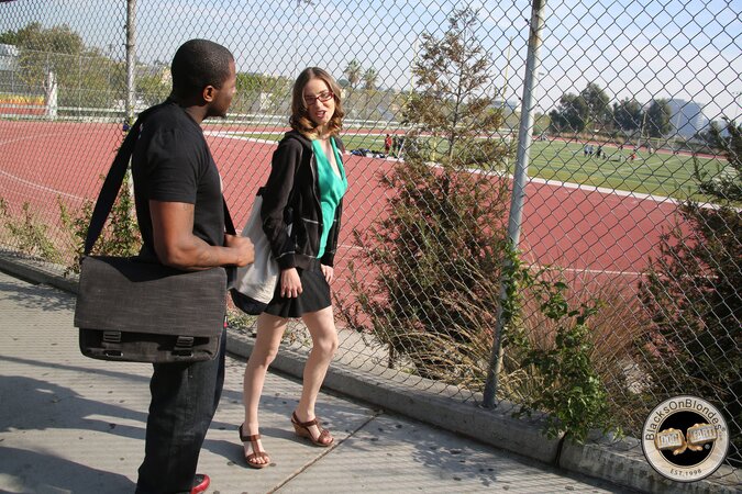 Stimulating girl with glasses flirts with a black man and soon has sex with him