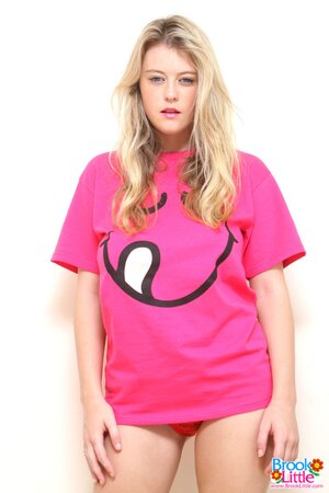 Busty blonde can never miss a chance to perform striptease before camera