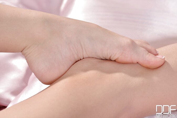 Babe can't get enough of her feet because she wants to lick them in bed