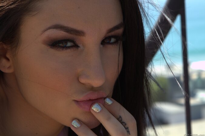 Flaming girl in red shorts spreads her small buttocks and expose her back door