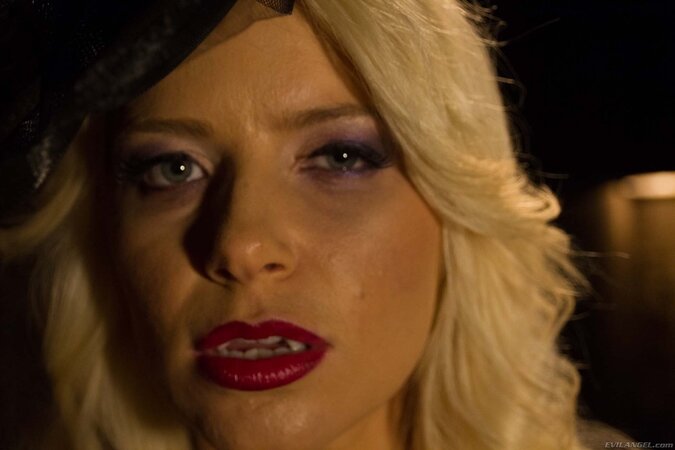 Ravishing vampire sneaks in darkened cellar to show juicy boobs near wall