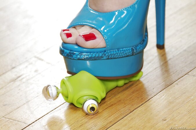 MILF in a blue dress changes high heels failing to hide her huge hooters