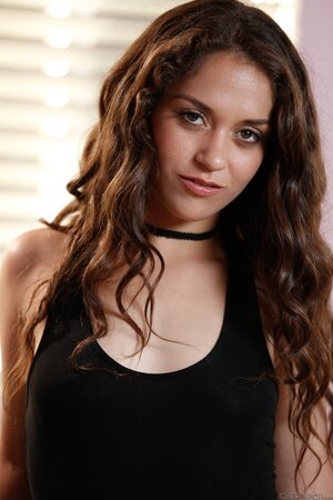 Finger-licking teen takes off jeans displaying perky tits and trimmed muff