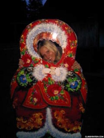 Blonde girl thinks about sex even when she is at the exhibition of wax figures