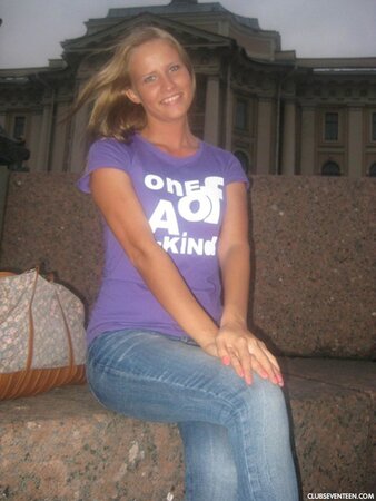 Blonde girl thinks about sex even when she is at the exhibition of wax figures