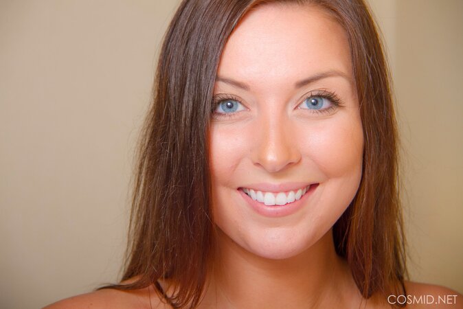 Comely amateur hussy plays with her cute tiny tits and firm nipples on the bed